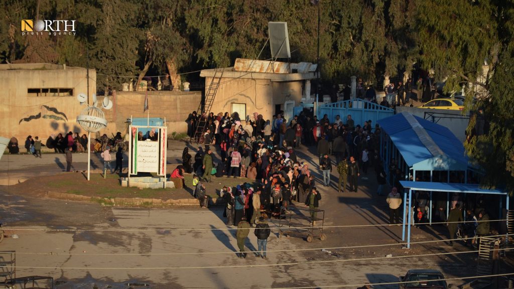 People waiting in front of al-Baath Automated Bakery in Qamishli – North Press