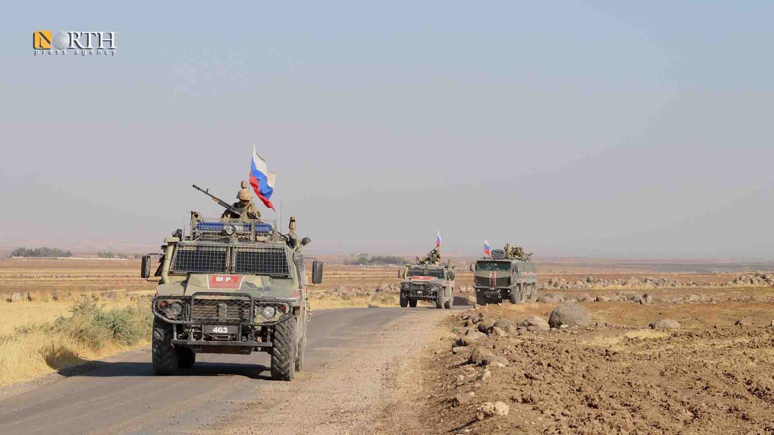 Russian troops conduct military patrol in Syria's Derik countryside ...