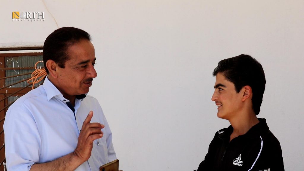 Former ISIS captive Erdewan with Yezidi House co-chair (North Press - Metin Hesen)