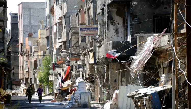 A bomb-damaged Tadamon area on 22 September 2013 – The Guardian