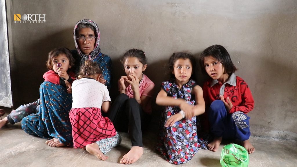 Children of north Syria's Kobani miss their fathers during Eid