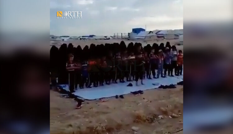 A child leading ISIS women during Eid al-Fitr prayer in Hawl Camp – North Press