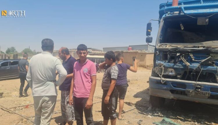 Residents in Qamishli inspect the damage to a truck transporting foodstuffs – North Press
