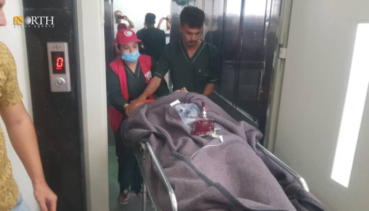 Woman wounded due Turkish shelling of Kobani is being transferred to Raqqa hospitals due to the deterioration of her health condition.