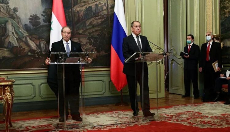 Russian Foreign Minister Sergei Lavrov with his Syrian counterpart Faisal Mekdad