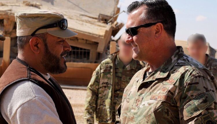 Muhanad al-Tala former leader of Maghaweir al-Thowra with a Coalition commander