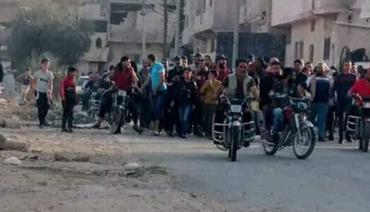 Protests in Tariq al-Sadd neighborhood in the city of Daraa
