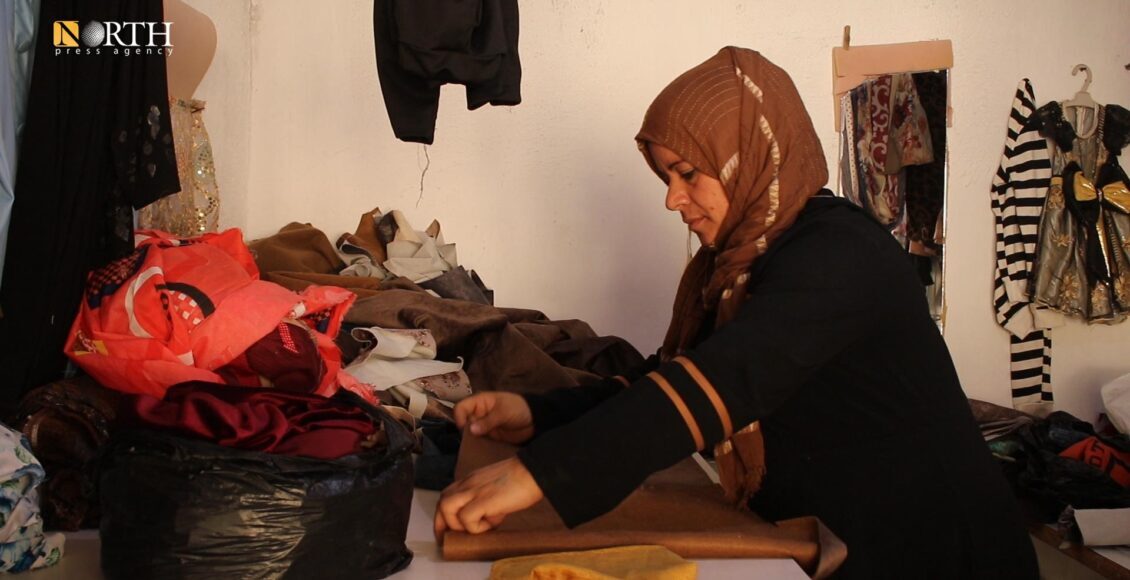 Shahida al-Anizi an IDP from Aleppo in a small sewing workshop - North Press