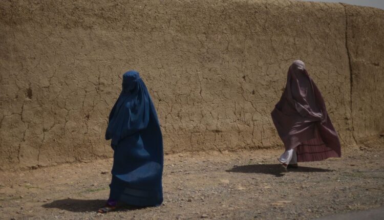 Women in Afghanistan forced by Taliban government to wear head-to-toe clothing in public