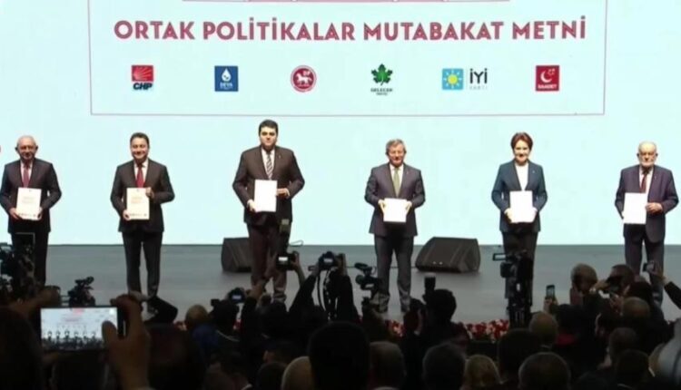 Table of Six in a press conference