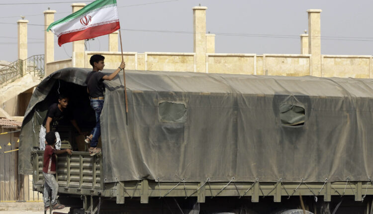 A military vehicle of Iranian-backed militias in al-Masrab Deseret, east of Deir ez-Zor, eastern Syria - AFP