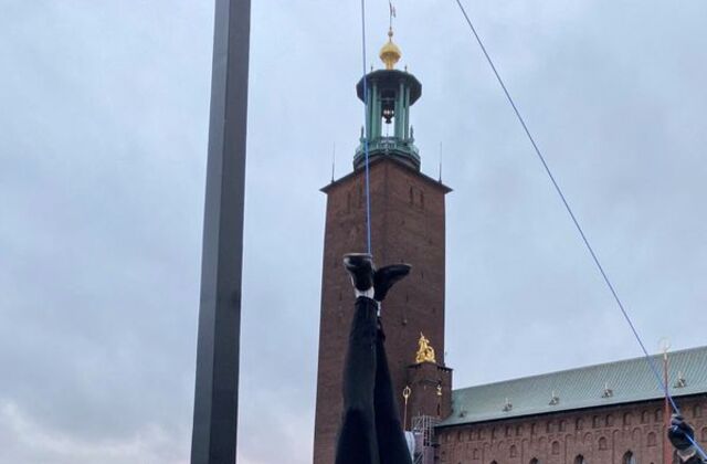 A puppet of Turkish President Tayyip Erdogan is hung by its feet during a demonstration in Stockholm, Sweden, Jan. 12, 2023, in this image obtained from social media. REUTERS