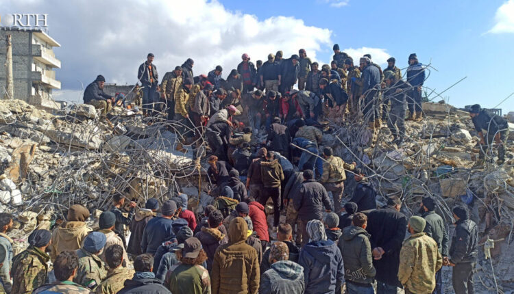 Civilians searching for survivors under a heap of rubble in the town of Jindires west of Afrin, northwest Syria - North Press