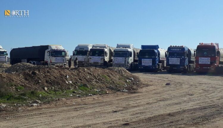 Trucks prepared by the Autonomous Administration of North and East Syria (AANES) to pass through Umm Jloud crossing, in Syria's Manbij, to help people affected by the earthquake – North Press