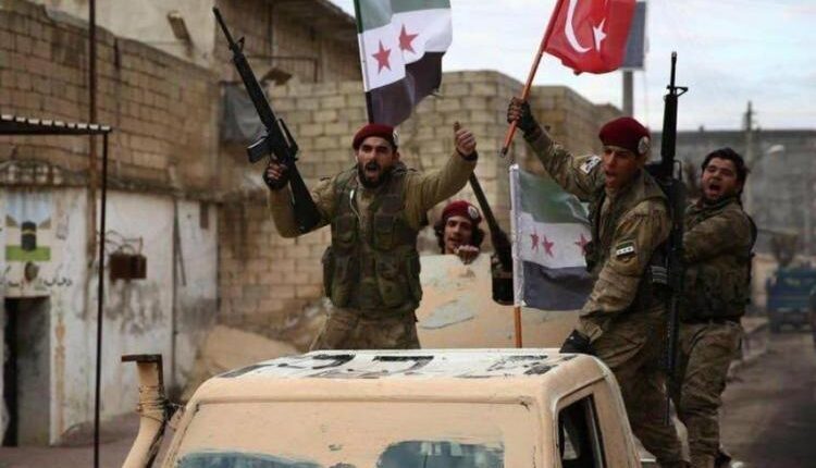 Militants of Turkish-backed SNA factions in the city of Sere Kaniye, northern Syria
