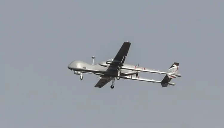 An Israeli Heron military drone flies over the southern Israeli city of Ashdod near the border with Gaza on Nov. 13, 2019 – Reuters