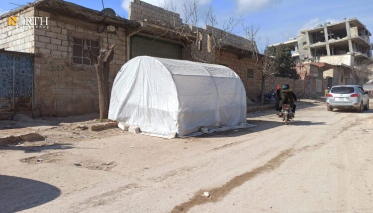 Tents erected by residents in the town of Jindires in Afrin countryside, northwest Syria, in front of their houses following the Feb. 6 earthquake – North Press