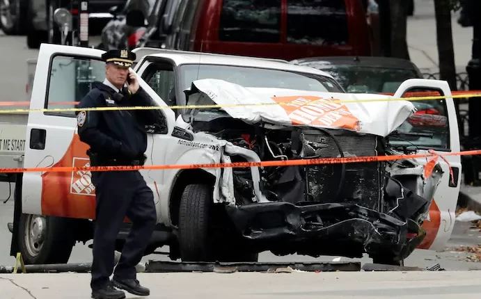 The truck at the scene of the killings in 2017 - Mark Lennihan/AP