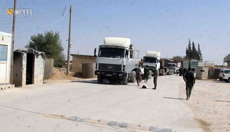 Trucks loaded with goods at Awn al-Dadat crossing between the AANES and Turkish-backed Syrian opposition – North Press/archive
