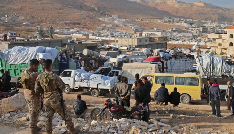 Syrians leaving Lebanon through the Wadi Hamid crossing in Arsal in 2022 – AFP