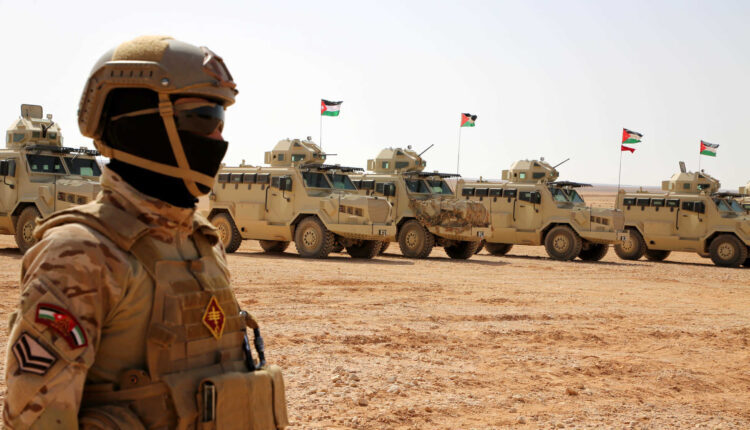 A troop and military armored vehicles of the Jordanian forces