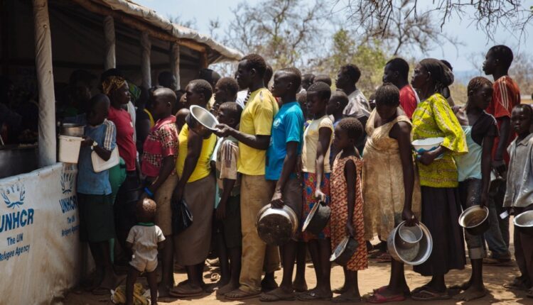 Refugees in South Sudan line up for a meal – United Nations