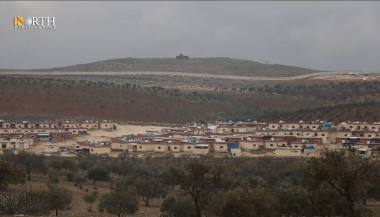 The village of Kherbet Eljoz in northwest Syria and the Turkish border behind – North Press
