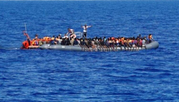 A boat carrying migrants near the Libyan coasts