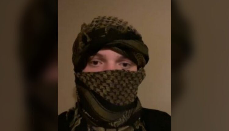 Davin Meyer with his head wrapped in videos he sent to an FBI informant - US Department of Justice