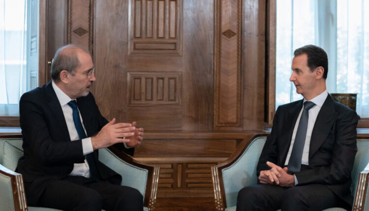Syrian President Bashar al-Assad with Jordan’s Foreign Minister Ayman Safadi in Damascus
