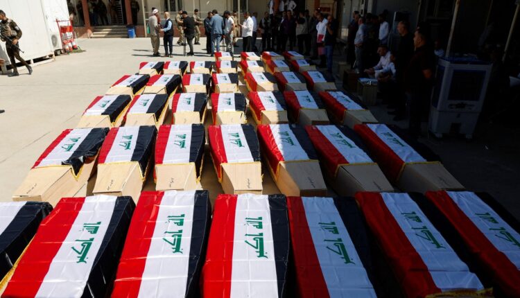 Remains of Yazidis who were killed by ISIS in 2014, after they were exhumed from a mass grave in Iraq