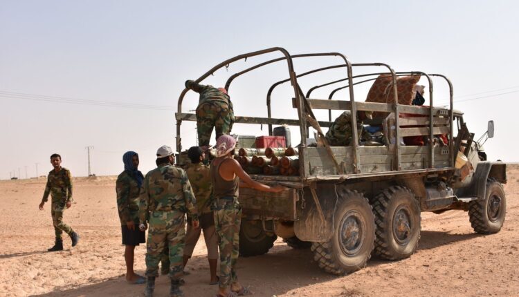 Soldiers of the Syrian government forces in Deir ez-Zor desert