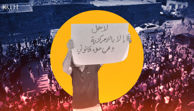 A protestor in Suwayda Governorate, southern Syria, demands implementation of a decentralized rule in Syria – North Press