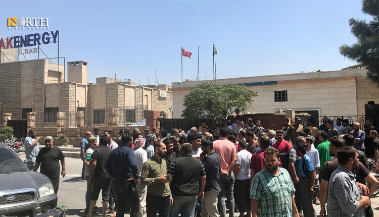 Protestors closing a center of the Turkish company AK Energy in the city of al-Bab, east of Aleppo – North Press