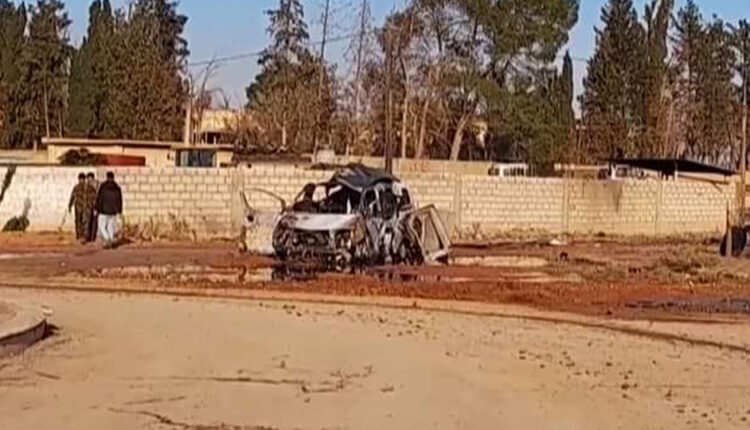 Car targeted by Turkish attack in Qamishli countryside, northeast Syria, on Nov.22, 2023