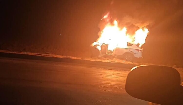 A car burned as a result of a drone strike in the town of Amuda in the east of the city of Qamishli, NE Syria, on Nov. 23, 2023
