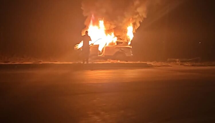 A car burned as a result of a drone strike in the town of Amuda in the east of the city of Qamishli, NE Syria, on Nov. 23, 2023