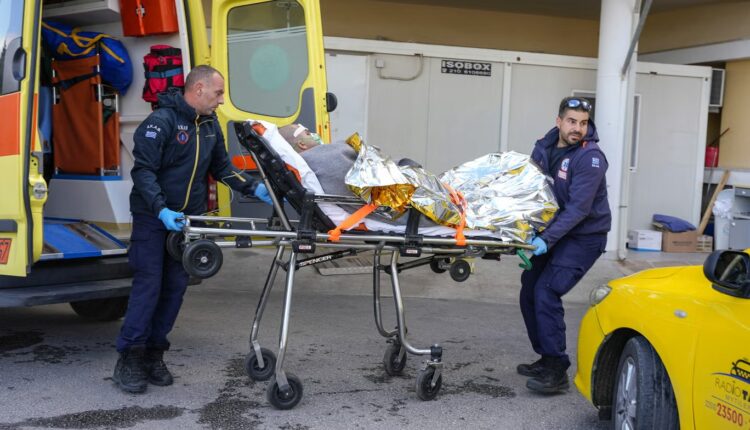 Paramedics transfer a survivor of a shipwreck at a hospital on the northeastern Aegean Sea island of Lesbos, Greece, on Nov. 26, 2023 - AP