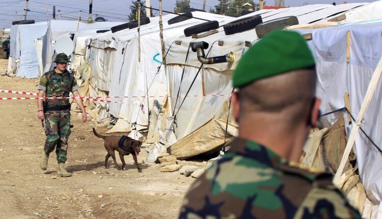 The Lebanese security forces in a Syrian refugee camp in Lebanon