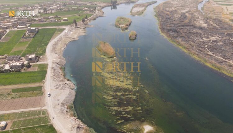 The Euphrates River separates the towns of Hajin, under the control of the Syrian Democratic Forces (SDF), and al-Majawda, under the Syrian government forces' control, east of Deir ez-Zor, eastern Syria – North Press