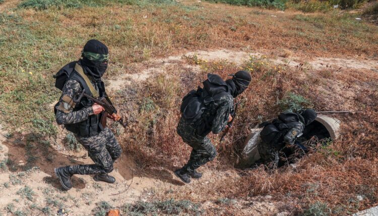 Militants of Hamas while entering one of the tunnels in the Gaza Strip.