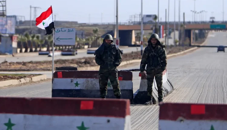 A checkpoint of the Fourth Division of the Syrian government forces – Reuters
