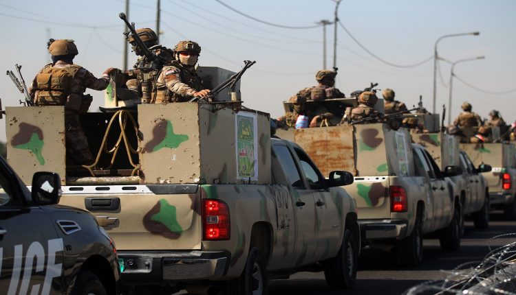 Iraqi forces conducting a military operation to pursue ISIS cells.