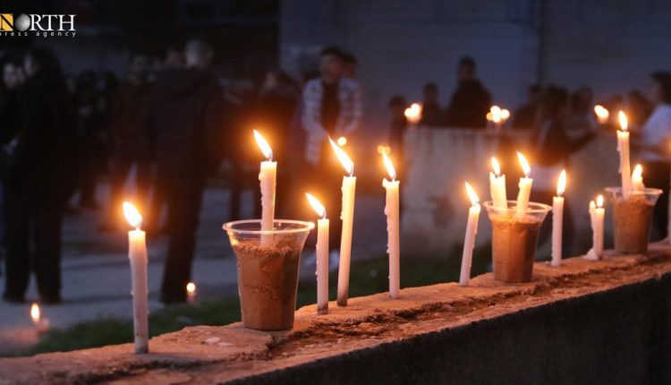 Assyrians in the town of Tel Tamr, northeastern Syria, lighting candles to remember the 2015 ISIS attack on their villages in the region. – North Press