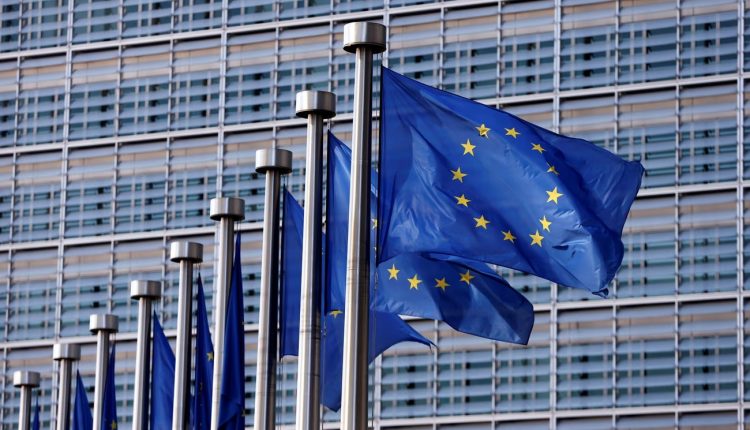 EU flags flutter outside the EU commission headquarters in Brussels - Reuters