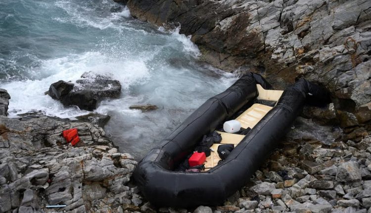 A dinghy lies on the shore after a shipwreck where two migrants were killed and eight were rescued, in Thermi, on the northeastern Aegean Sea island of Lesbos, Greece, on Jan. 10, 2023 - AP