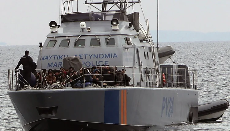 Immigrants abroad a Cyprus marine police patrol boat after being rescued from their own vessel off the coast of Protaras, Cyprus, Jan. 14, 2020 - AP
