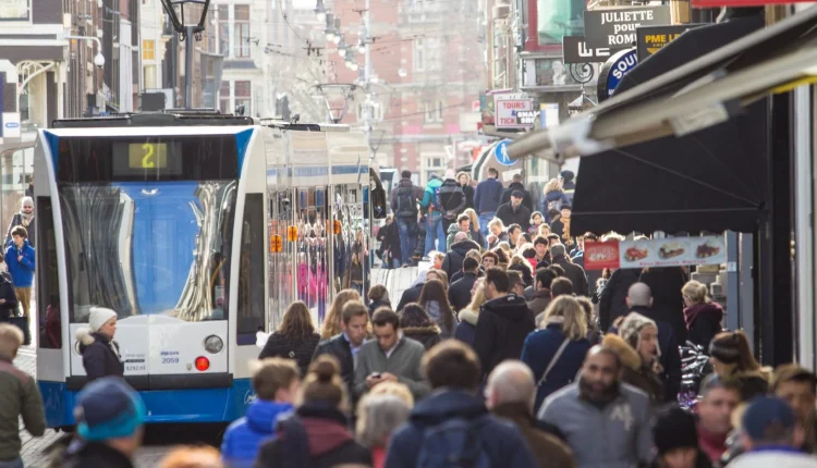 A crowded Leidsestraat in Amsterdam in Netherlands