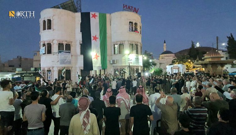 People in Aleppo countryside protest against Syrian opposition