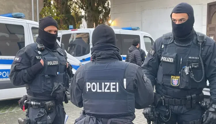 German police officers work during a raid in Berlin, Germany, Nov. 16, 2023. - Reuters